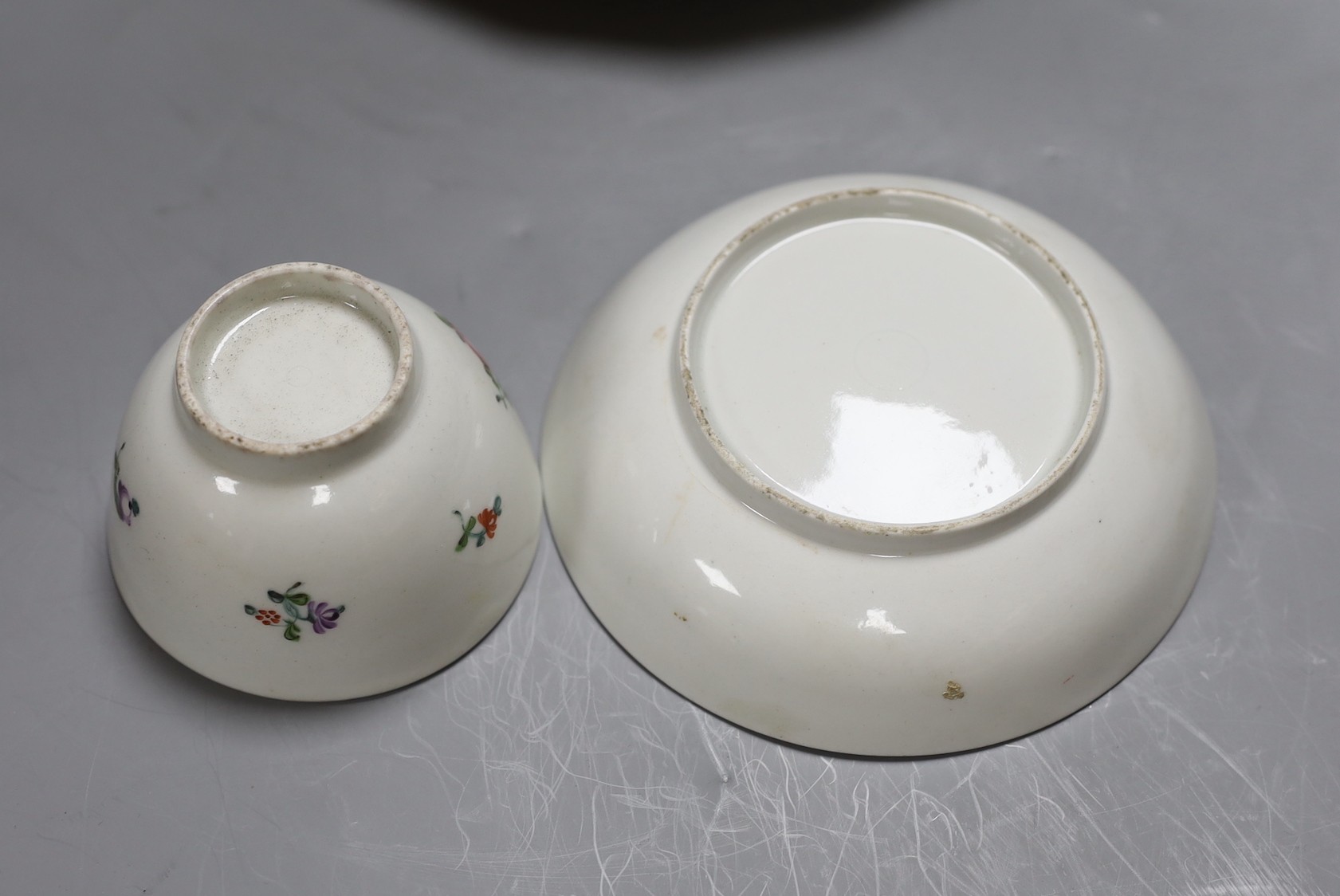 A Longton Hall cabbage leaf sauceboat and two similar creamboats, c.1755, faults and Newhall type tea wares, largest jug 22 cms wide